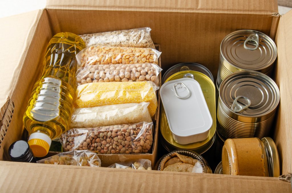 uncooked foods in carton box prepared for disaster emergency conditions